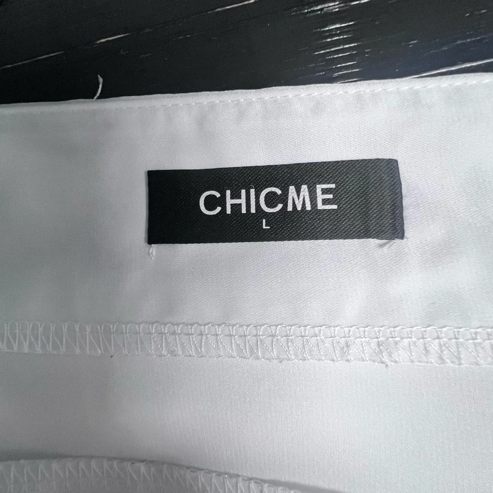 Chic White Off-Shoulder Blouse with Gold Accents - Picture 5 of 9